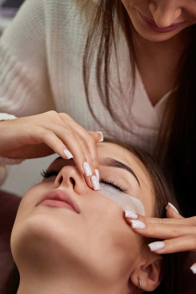 Woman receiving lash lift & tint at Crave Aesthetics in London, Ontario